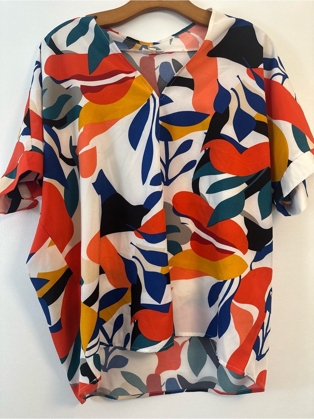 JODIFL Multicolor Abstract V-Neck Top with Red and Blue Accents